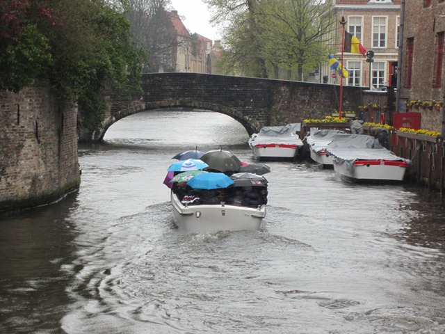 Canal%20ride%20with%20umbrellas%20closer%20up.jpg