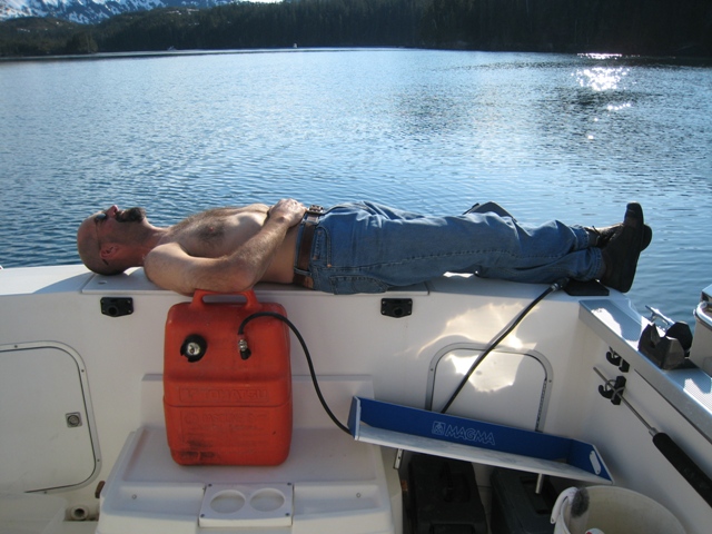 scott%20laying%20on%20boat.JPG